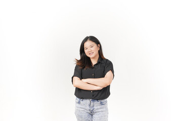 beautiful Asian woman stands with her arms folded across her chest, exuding confidence against a white background