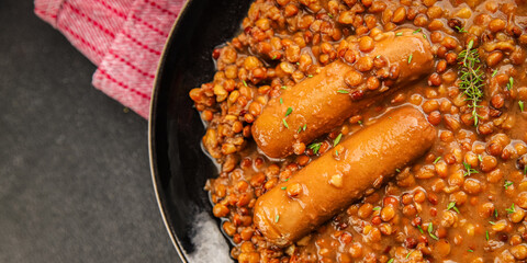 Lentil with sausages tasty food dish second course аresh delicious gourmet food background on the...