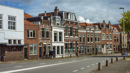Street in Historical City Centre with Old houses, Gouda, Netherlands