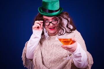 Vacation and Holidays. Funny Drag Queen poses in the studio.