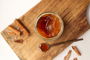 Creative layout made of honey and curcuma on the wood background. Flat lay. Food concept. Macro concept. 