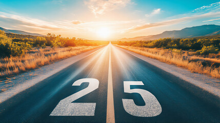 Year 2025 inscription on asphalt road. 2025 asphalt road year text. Road written year "25" text on asphalt Road.