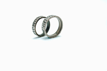 rustic wedding ring isolated on white background.