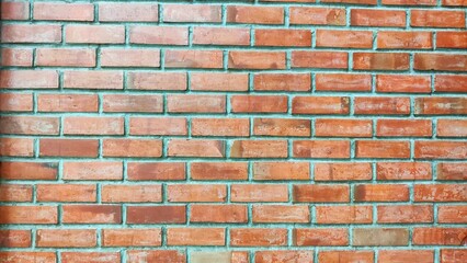 Obraz premium Brick wall texture with warm tones, ideal for construction and design themes.