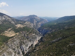 A photo of a view of a mountain with a valley and a valley