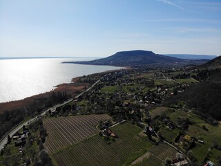 A photo of a view of a small town and a body of water