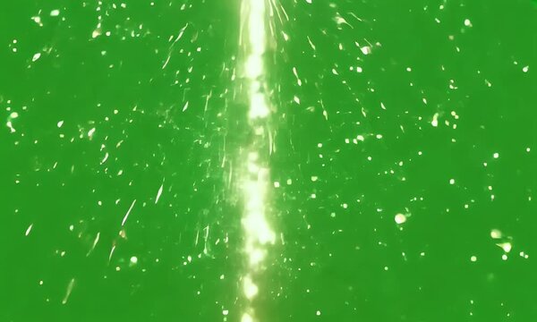 A lightning bolt made of glitter flashes across the green screen, scattering sparkles as it moves.