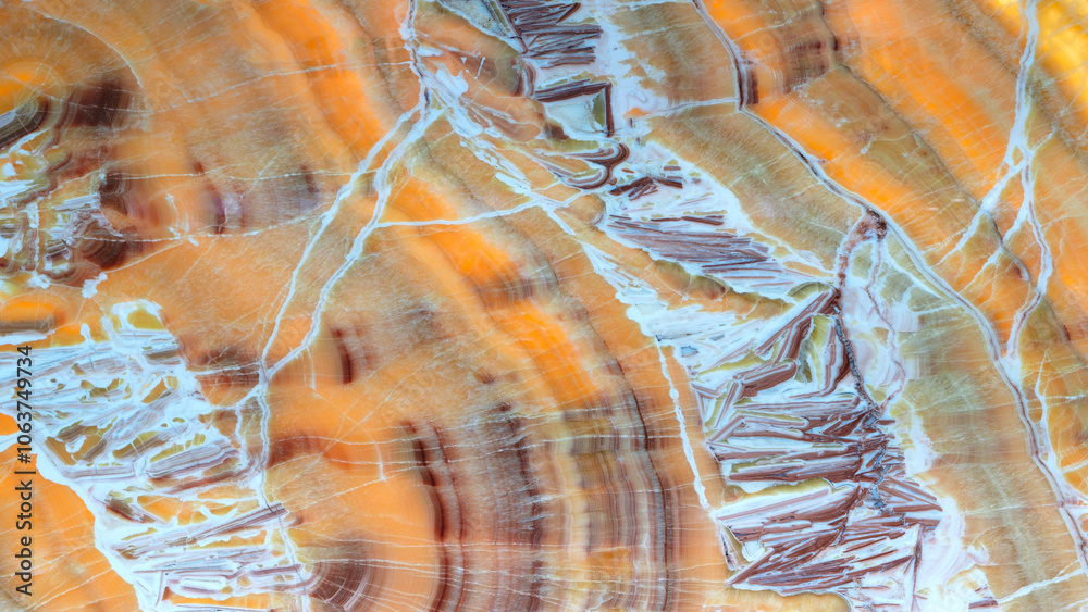 Aufkleber a large piece of stone with a pattern of brown and white swirls. the stone appears to be a type of m
