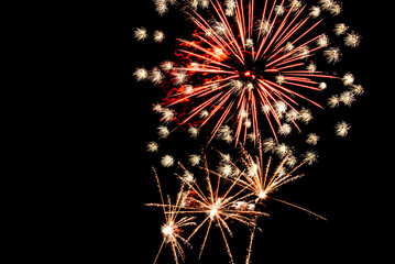 Fireworks lighting up the night sky. Pyrotechnics, abstract	