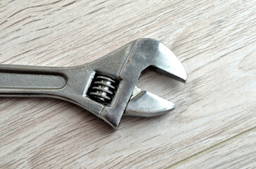Manual adjustable wrench made of stainless steel.