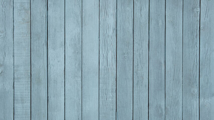 Fototapeta premium A blue wooden board with a few scratches and dents. The board is long and narrow, and it is made of wood