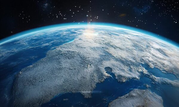 A breathtaking view of Earth from space, continents covered in a blanket of white snow, a stark reminder of winter's reach from a celestial perspective.