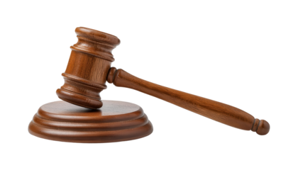 Wooden gavel on a round base, symbolizing justice and legal authority, on a white isolated background.