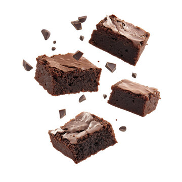Floating chocolate brownies with falling chocolate pieces for dessert designs - png set transparent background