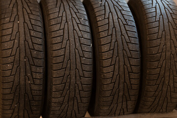Close-Up of Four High-Performance Tires with Detailed Tread Patterns