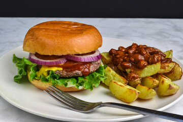 hamburger  served with potato wedges  top with chili