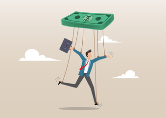 Slave businessman puppet doll being controlled by money