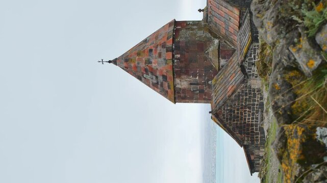Timelapse Sevanavank monastic complex building with Sevan lake view. Peninsula at the northwestern shore of Lake Sevan in the Gegharkunik Province of Armenia. Popular travel sightseeing attraction