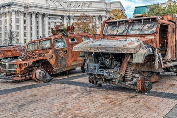 Kyiv, Ukraine - October 27, 2023: Destroyed Russian military vehicles on display on Mykhailivska Square, Kyiv, with the Ministry of Foreign Affairs of Ukraine building in the background