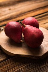 Ripe pears  dark background, rustic style, top view. fresh and healthy food. Autumn background. © Maria
