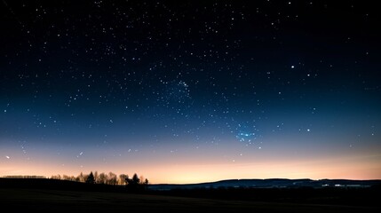 Fototapeta premium A serene dusk sky sprinkled with twinkling stars above a silhouette of distant hills and sparse trees, evoking calm and wonder.