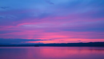 Fototapeta premium A serene landscape at dusk with colorful hues in the sky above a tranquil lake, colorful, tranquil