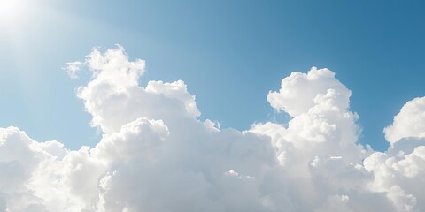 A serene image of fluffy white clouds floating in a clear blue sky, creating a tranquil and peaceful atmosphere, floating, serene