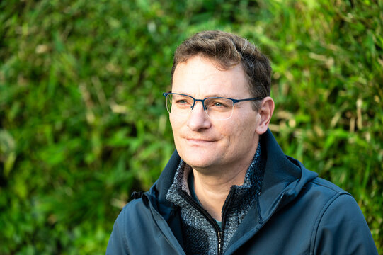 Portrait of a 45 yo white man outdoors in Koekelberg, Brussels, Belgium