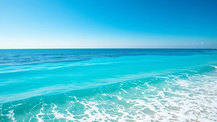 Obraz premium A mesmerizing view of the vast ocean showcasing varying shades of blue, with gentle waves rolling towards the sandy shore, peaceful, beauty
