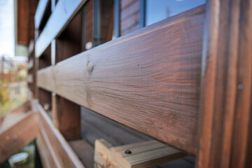 Close-up of angled wooden panel structure