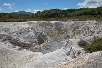 A rugged, hot and dangerous landscape of the geothermal parks of Rotorua, New Zealand.