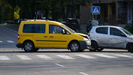 Traffic accident. Wrecked car. Car crash accident on street, damaged automobiles after collision in...