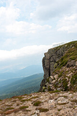 Sniezne Kotly in the Karkonosze Mountains, Poland, offers breathtaking views of rugged peaks and valleys