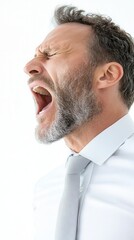 Fototapeta premium Office worker expressing intense frustration while shouting against a white background during a stressful moment in the workplace