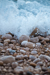sea wave rolling on the rocks