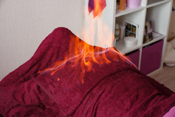 Tibetan fire massage. Traditional tibetan medicine, fire treatment and bodycare concept