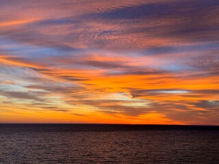 Sunset dramatic sky over sea.