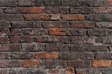 old vintage wall made of red brick.