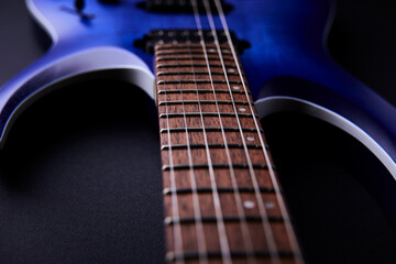 Fototapeta premium Fretboard of modern electric guitar. Close up.