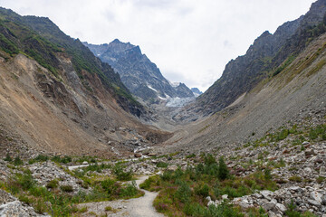 Fototapeta premium Chalaadi Glacier, Mestia, Svaneti, Georgia, beautiful glacier in the Caucasus mountains on a cloudy day