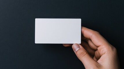 Fototapeta premium Consultant Holding Blank Business Card