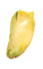 Half of peeled pistachio nut isolated on white