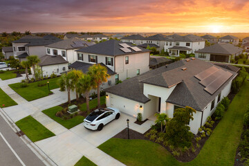 American gated community houses in rural US suburbs. View from above of large residential homes in...