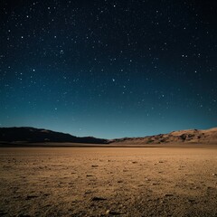 Starlit desert under a clear night sky, showcasing a secluded, serene landscape with mountains in the distance.