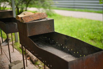 the barbecue area. metal barbecues.