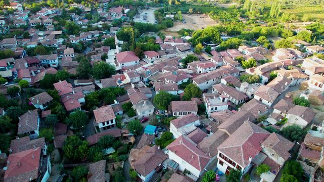 Sirince is a neighbourhood in Selcuk, İzmir Province, Turkey. Aerial drone view of ancient village Sirince. Beautiful landscape of Sirince with traditional historical houses.