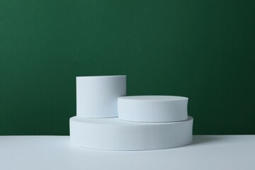 White podium on two tone background