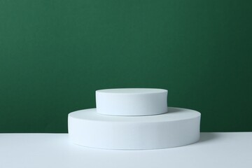 White podium on two tone background
