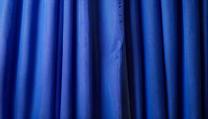 Navy blue curtain with many folds background texture