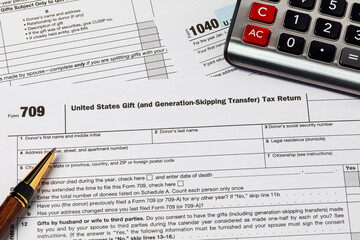 Gift tax form for filing income taxes. Gift tax exclusion, gift tax limit and income tax return concept.